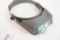 One Opti-Visor with jewelers loupe. Used.