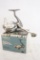 One Guide Series Pro spinning fishing reel with extra spool. In box, used.