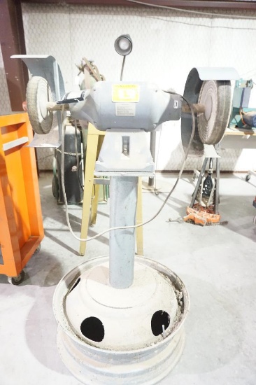 One Baldor 3/4 HP dual buffing wheel/grinder on large tire rim and stand. 29" x 46", not including