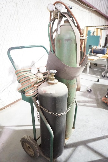 Oxy-Acetylene Torch setup. Comes with bottles, dolly, hoses, & regulators. No shipping