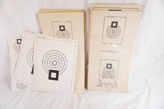 Large stack of sight-in shooting targets.