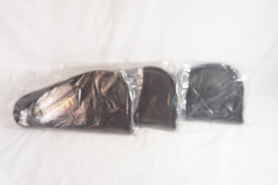 Three Kolpin padded pistol cases. In packages.