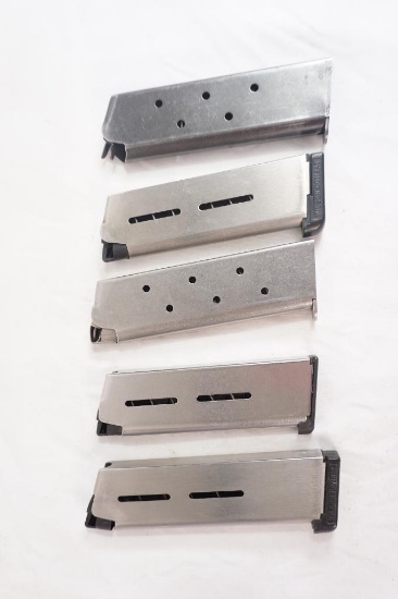 Five 1911 magazines. Used.