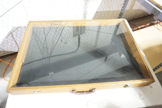 Two Oak display cases. 31" x 22" x 3". Used. Will not ship, pick-up only.