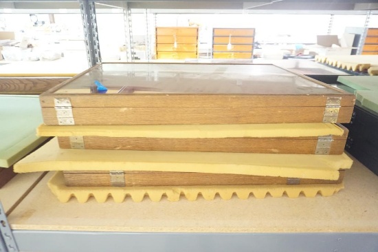 Three Oak display cases. 31" x 22" x 3". Used. Will not ship, pick-up only.