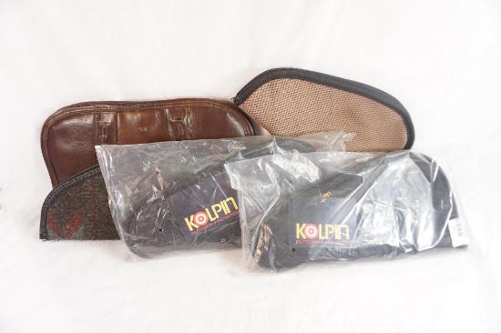 Five assorted sizes of padded pistol cases.