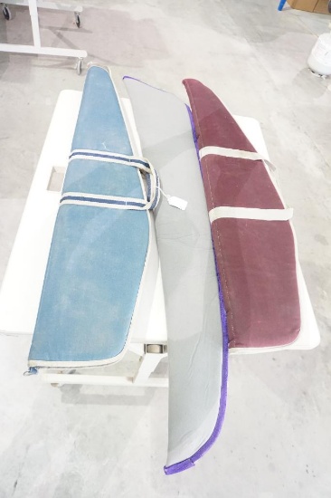 Two soft sided padded rifle cases, and one neoprene slip gun case. Used.