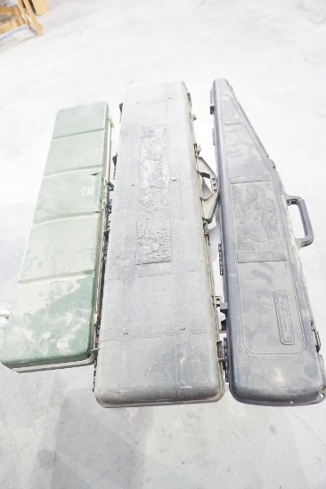 Three hard plastic gun rifle cases. Used. shipping will incur additional costs.