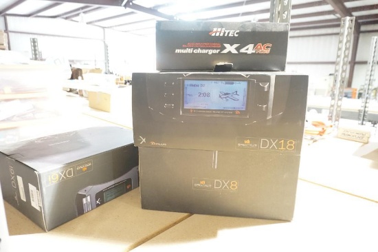Four empty RC controller boxes.