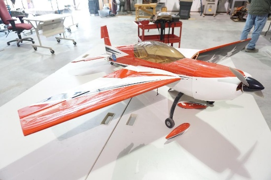 One large RC remote controlled RC plane. Length 54" width of wings two pieces 27" each, total width