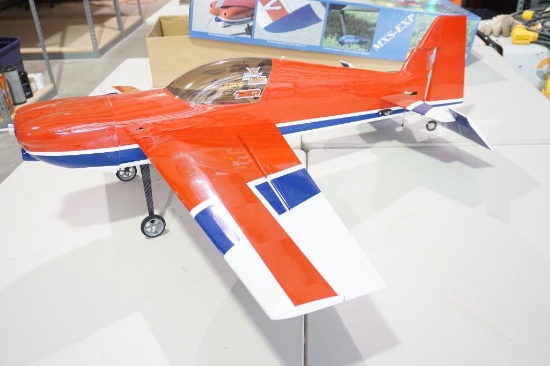 One Extreme Flight MXS_EXP radio controlled RC plane. length 46", wings and fuselage 56". With box.