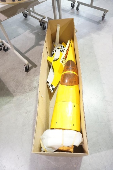 One large RC plane in box. Will not ship, pick-up only.