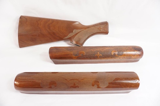 One wood shotgun butt stock, and Two shotgun forearms for automatic. Used.