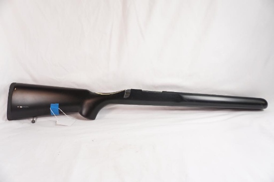 One polymer right handed rifle stock blank. It's been bedded.