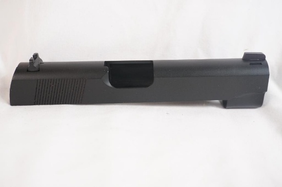 One 1911, 4 inch slide. No internals. Looks unused.