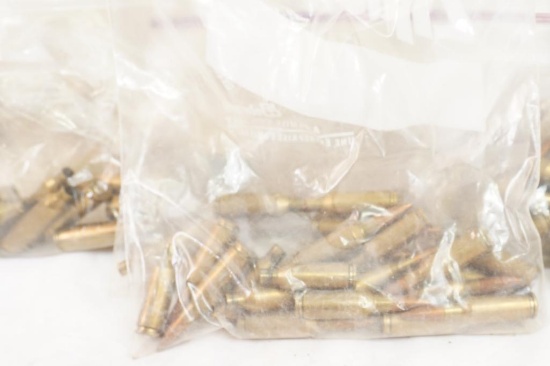 Bag of recoil springs , shock blocks for Ruger mini-14, and some custom Crawley pistol parts.