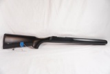 One polymer right handed rifle stock blank. It's been bedded.