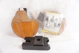 One belt radio holder, and two in the waistband leather holsters with pager pal.