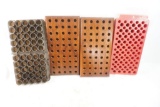 Four reloading blocks. Two wood and two plastic.