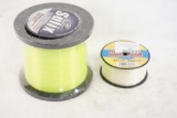Two spools of mono fishing line. One Omniflex 12# and one bulk Sufix 14#.