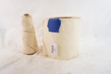 One roll of baker's or butcher's twine, and one roll of sticky back paper.