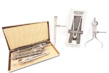 Eight metal spring compass calipers.
