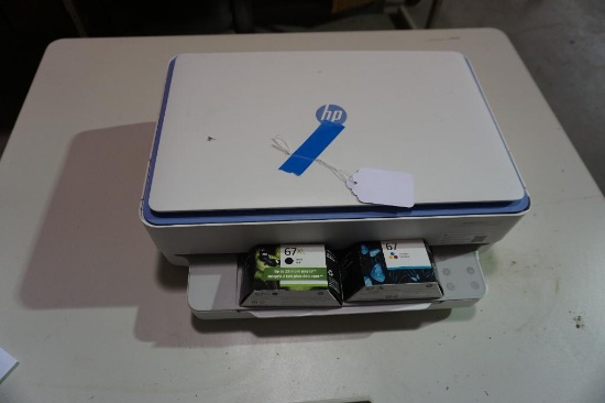 HP Envy 6065E printer with extra ink cartridges