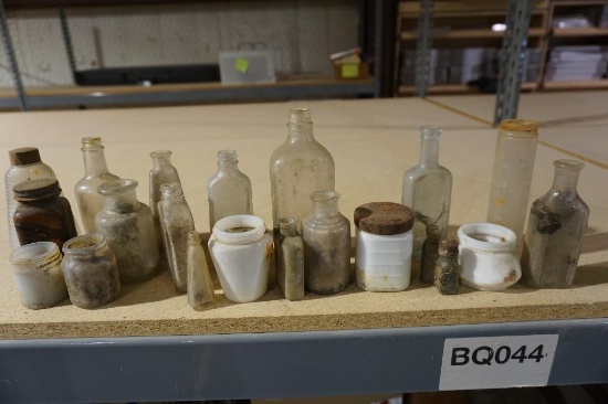 Miscellaneous small antique and small old bottles.