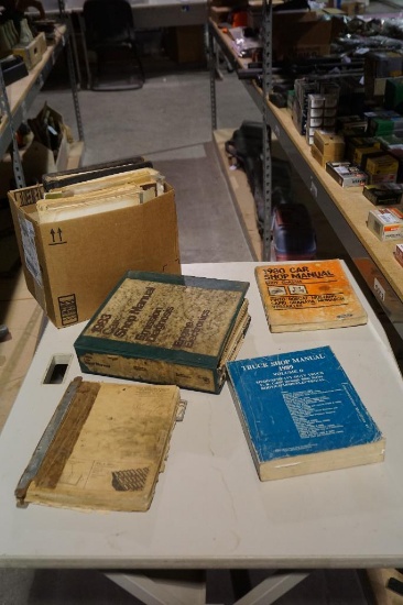 Two boxes of shop manuals. Used.