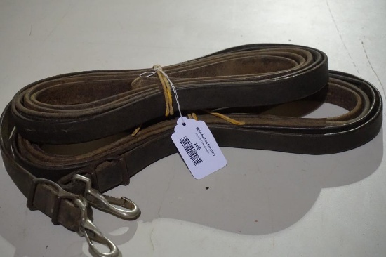 One set of leather driving reins. Used.