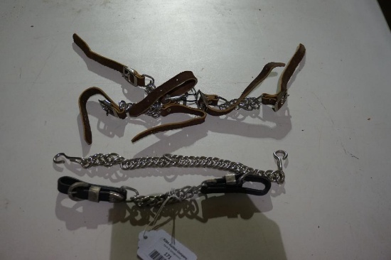 One leather curb chain, one English bit curb chain, three leather curb chains. Used.