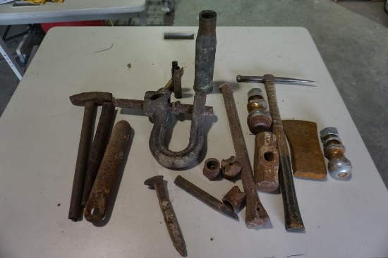 Old welding hammer, miners rock drilling punch, axe and sledge hammer heads, etc.