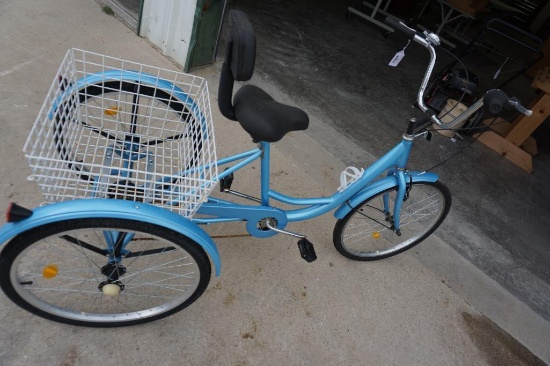 Light blue 7 speed tricycle. Has basket on rear. Used, but in very nice condition