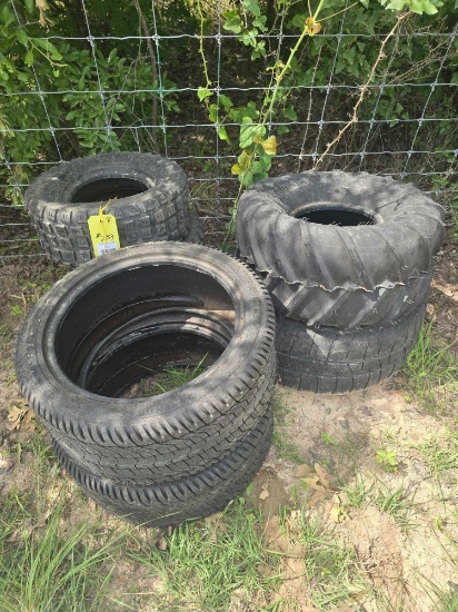 Five ATV tires and two 205/40 R14 tires, like new.