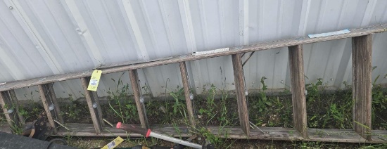 One ten foot wood step ladder, used.