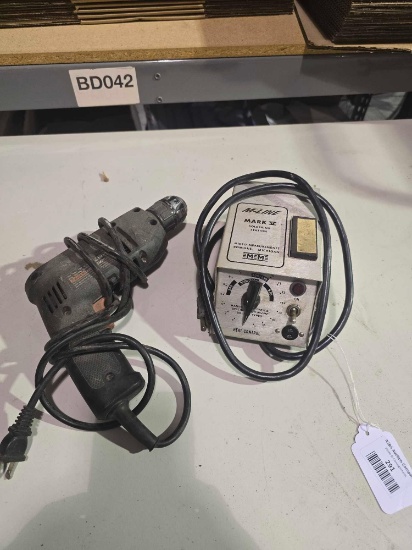 One M-Line electric soldering station, and one Black & Decker 3/8 drill. Used.