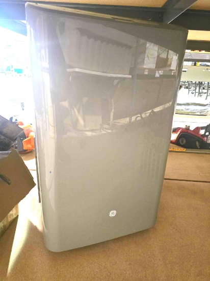 One small room air conditioner.