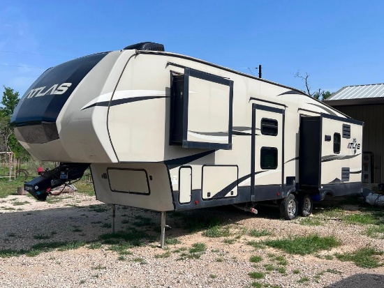 Keystone Atlas 2020 RV. Very nice condition with 4 slides. 1 main bedroom & 1 bunk bed room. Huge
