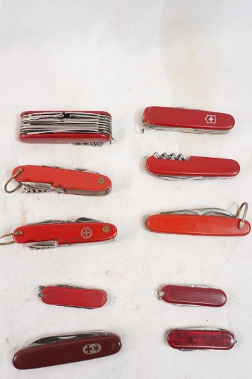 Ten folding multi tool pocket knives