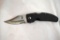 One Spyderco folding lock back knife with belt clip.
