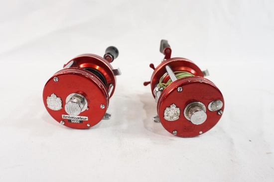 Two Abu Garcia Ambassadeur baitcasting reels, one is a 5000