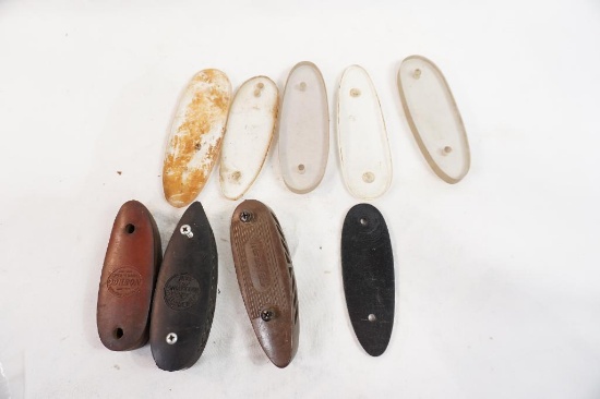 Three recoil pads and 6 acrylic buttplates