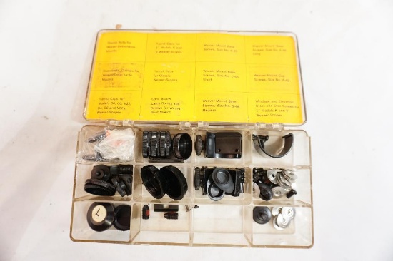 Plastic box of weaver scope repair items, caps, screws, etc