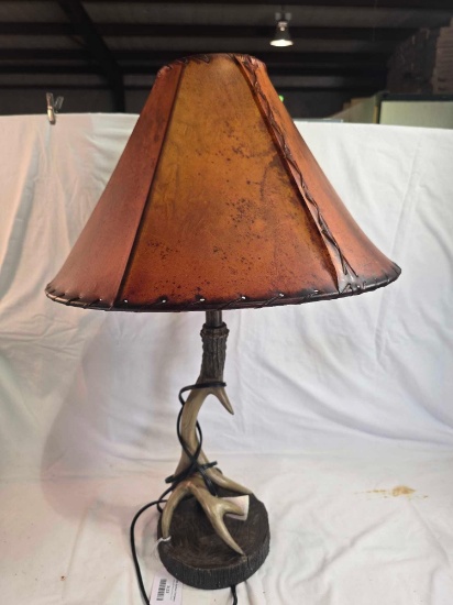 One plastic deer antler lamp.