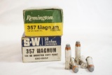 Two boxes of 357 Magnum 158 gr JSP, one Remington and one S&W, 100 count total