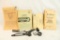 Four books, infantry field guides etc, and bag of miscellaneous gun parts