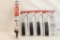One package of Birchwood 22 handgun cleaning brushes, and four packages of angled cleaning brushes.
