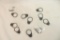 Eleven AR 15 receiver stock latch plates. In packages.