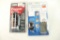 One Sabre door alarm and one one Sabre pepper gel spray. In packages.
