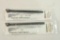 Two M14/M1A spring guides. In packages.